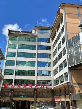 Jinshancheng Business Hotel Отели рядом с достопримечательностью «Отдел Управления охраны Уезда Чуанбэ, национальный природный заповедник Юньнань Циншань»