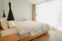Luxuriant Land Hotel