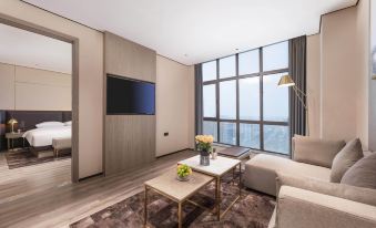 Qingneng Yishang PLUS Hotel (Suzhou Wujiang East Taihu Wanbao Commercial Plaza)