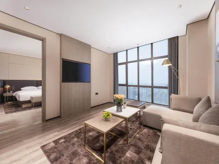 Echarm Plus Hotel (Suzhou Wujiang East Taihu Wanbao Shopping Plaza)