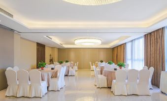 Vienna Hotel (Shuyang High-speed Railway Station Tianying Building Materials City Shop)