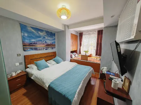 Kangding Jiudu Chinese Inn Отели рядом с достопримечательностью «Princess Bridge»