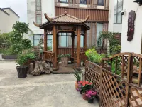Caotang Garden Hotel Отели рядом с достопримечательностью «И Цин-Саунд»