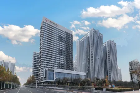 QIANNA HOTEL GLORIOUS (Zhoukou Chuanhui District High-speed Railway East Station Branch)