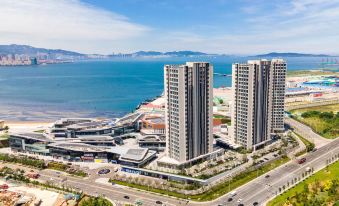 Tuyuan Seaview LOFT Holiday Apartment (Weihai Ferry Terminal Huafa Xintiandi Branch)