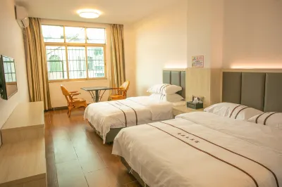 Chengmai Jindingchun Hotel Hotel dekat XinChun GouWu YiTiao Jie