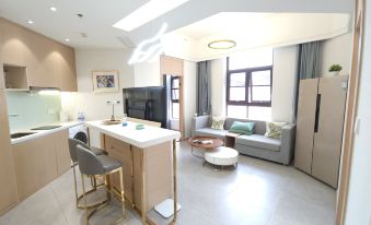 Erjia Apartment (Wuxi Greenland Guanlanwan Shop)