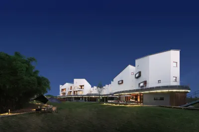 MUNWOOD WHITE VILLA Hotel dekat CPC Chengdu Longquanyi District Committee Party School