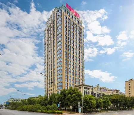 Zhuji Qingmanli Hotel Отели в г. Чжуцзи