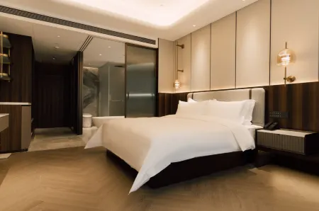 Yinan Tianlong Blue Horizon International Hotel Отели в г. Инань