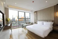 Glade Hotel (Qingdao Hongdao High tech Zone Fantasy Kingdom Branch) Отели рядом с достопримечательностью «Фэй Ян Институт профессиональных технологий»