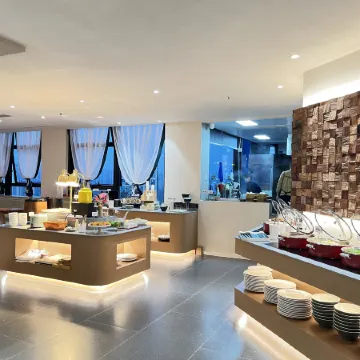 Zhongyu Liangjiang Hotel Отели рядом с достопримечательностью «Спортивный Центр Гокко»