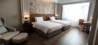 Vienna International Hotel (Heping Road Longkou Plaza) - servizio colazione