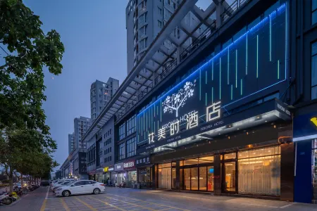 Huameishi Hotel,Xinyi Отели в г. Синьи