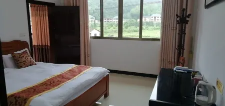 Jinggangshan Bajiaolou Inn Отели рядом с достопримечательностью «Octagon House»