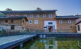 Yongding Earth Building Duilu · Shengheng Building World Heritage Home Stay