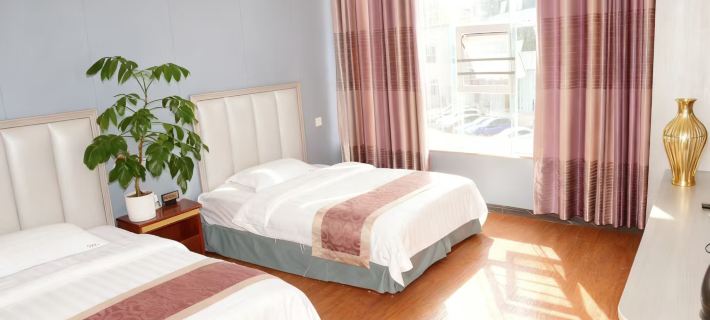 Defu Business Hotel (Yilong Xinzhengzhen Branch) Hotel a Yilong