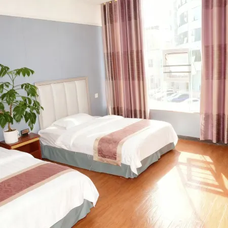 Defu Business Hotel (Yilong Xinzhengzhen Branch)