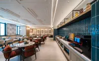 Taiyuan South Station Jinyang Street Manxin Hotel - parking