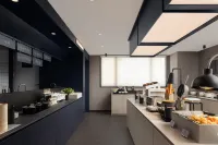 Xuzhou Yunlong Wanda Medical University Residence Hotel - فطور
