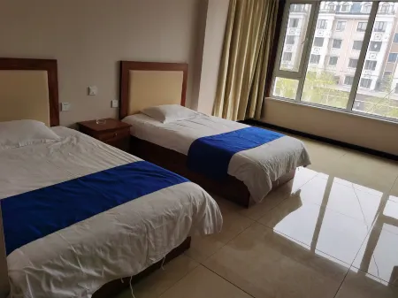 Delong Business Hotel Отели рядом с достопримечательностью «Harbin Vocational College of Science and Technology»