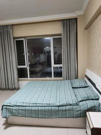 Fengcheng Tianhewan Yangyang Jinzuo Apartment Отели в г. Фенчен