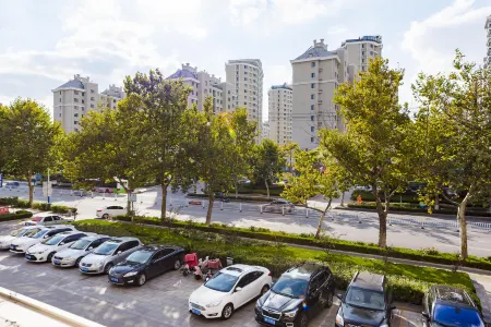 Weihai Yujing Business Hotel Отели рядом с достопримечательностью «Aodaliya Kunshilan Occupation Technology (Nan'an) College Weihai Branch»