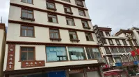 Kangding Woju Chinese Inn Hotel dekat Sichuan Kangding Guzanzhen Station