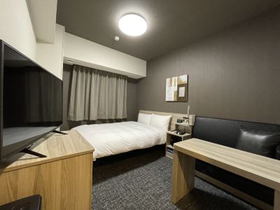 スタンダードセミダブル喫煙 ホテルルートイン見附 -中之島見附インター-の写真