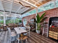 Mashan Juzihongle Boutique Stay - petit déjeuner