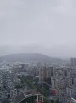 Kaili International · Qiyun Kaili Qiyun International Apartment - vue sur la montagne