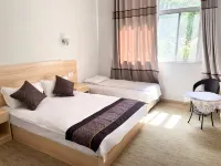 Yuanyuan Xingfu Building Hotel di Qingyuan Village (East Route)