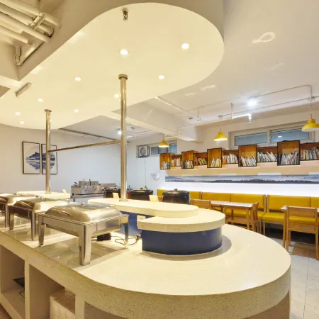Aichenshi Hotel (Baoding Tianxia Baobai Shopping Plaza)