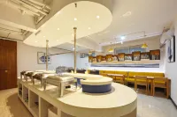 Aichenshi Hotel (Baoding Tianxia Baobai Shopping Plaza)