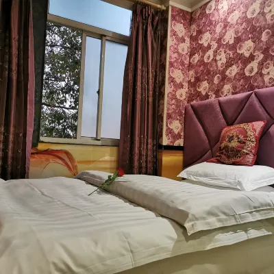 Pinhui Holiday Hotel Отели рядом с достопримечательностью «Северный вокзал Аньтин»