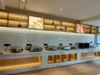 Ou Si Ka lnternational Hotel - servizio colazione