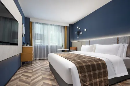 Loudi Huanlu Lichen V Hotel Отели рядом с достопримечательностью «Loudi Vocational and Technical College»