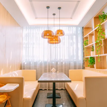 Qingmu Chain Hotel (Ma'an Shandong Railway Station Hongxing Meikailong RT-Mart)