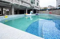 โรงแรมหมิงเฉวียนน้ำพุร้อน - สระว่ายน้ำบนดาดฟ้า