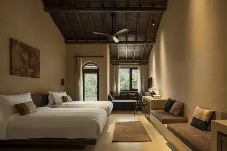 Xipo Longnan Weiwu Отели рядом с достопримечательностью «Binjiang Square»