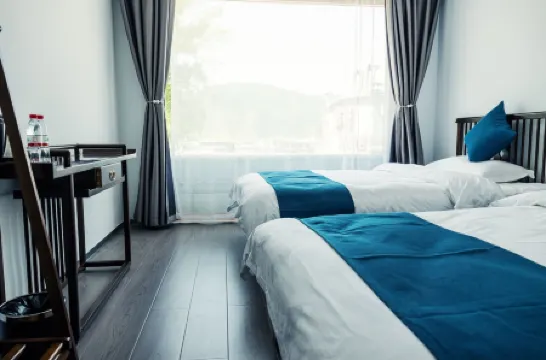 Wutaishan Yishan Yishu Boutique Hotel (Wuye Temple) Отели в г. Утайшань