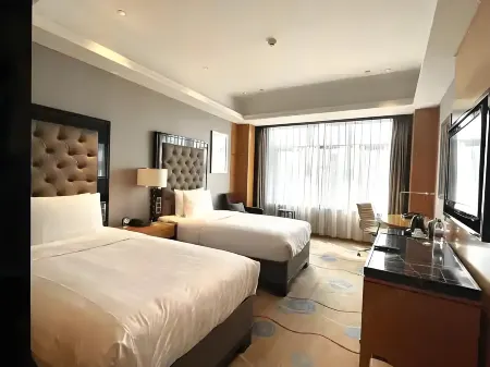 Yingjina Business Hotel Отели рядом с достопримечательностью «Пейзажный район чайного моря»