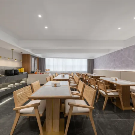 Qian Na Mei Su Hotel (Xiangcheng Wanda Plaza Oubaisa Mall Branch)