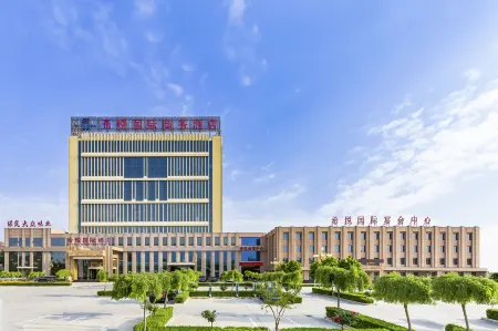 Hiyonda International Business Hotel Отели рядом с достопримечательностью «Baoding Bus Changchengchang Station»