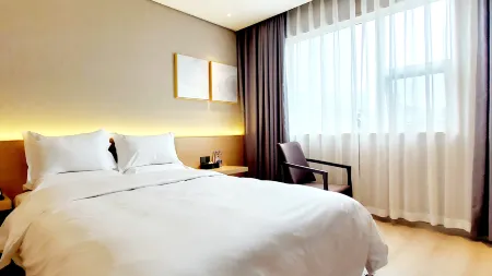 Jiuqi Yisu Hotel Отели рядом с достопримечательностью «Hanzhong Gymnasium»