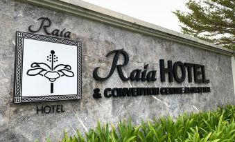 "a stone wall with a sign that reads "" raja hotel & convention centre aesculap "" in black" at Raia Hotel & Convention Centre Alor Setar