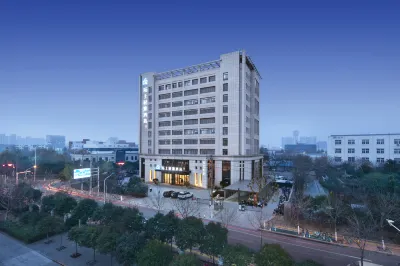 Moshang Qingya Hotel (Shenghua Li Shopping Center Jingkai Central Square Subway Station) Отели в г. Зона экономического и технологического развития Чжэнчжоу