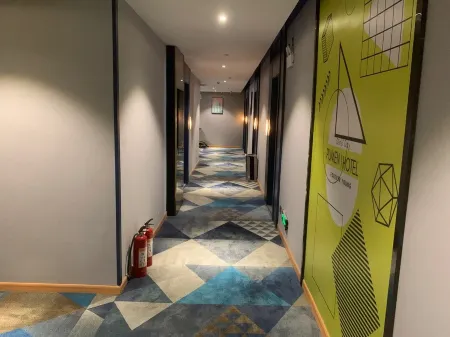 Pumen Hotel (Shigu Square) Отели рядом с достопримечательностью «Shigu Academy»