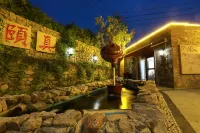 Beihai Xiaoyao Courtyard Homestay (Guantouling Liuxia Village) - บังกะโล