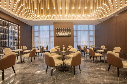 Mandoran Plus Intelligent Hotel (Jiangmen Hexing Square Branch) Отели рядом с достопримечательностью «Donghu Park»